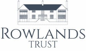 Rowlands Trust logo with an architectural drawing of a large house with 'Rowlands Trust', written underneath.
