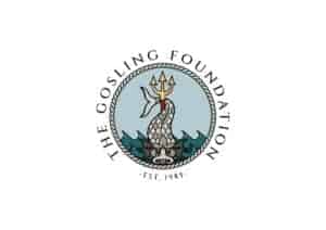The image is of a circular logo that has a fish tail shape in the middle around a fork. Around the top the words read 'The Gosling Foundation.' Then underneath 'Est 1985.'
