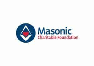 The image is of the a logo with a circle shape to the left and a heart in the middle with triangle v shapes around this. The words to the right read 'Masonic Charitable Foundation.'