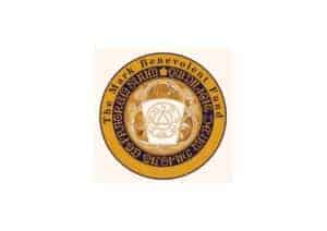 The image is of a circular logo that reads 'Mark Benevolent Fund.' On the inside are some markings also written down in what appears to be Latin.