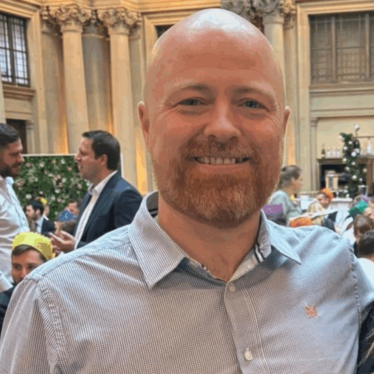 A man smiling in the camera