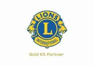 The image of a logo with two side profiles of a lion either side, reading 'Lions,' at the top. There's an 'L' in the middle with the word 'International' at the bottom. Then with the words, 'Gold Kit Partner,' underneath.