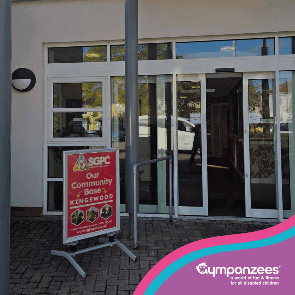Entrance of SPCC Our Community Base Kingswood, featuring glass doors and Gympanzees logo in the bottom right.